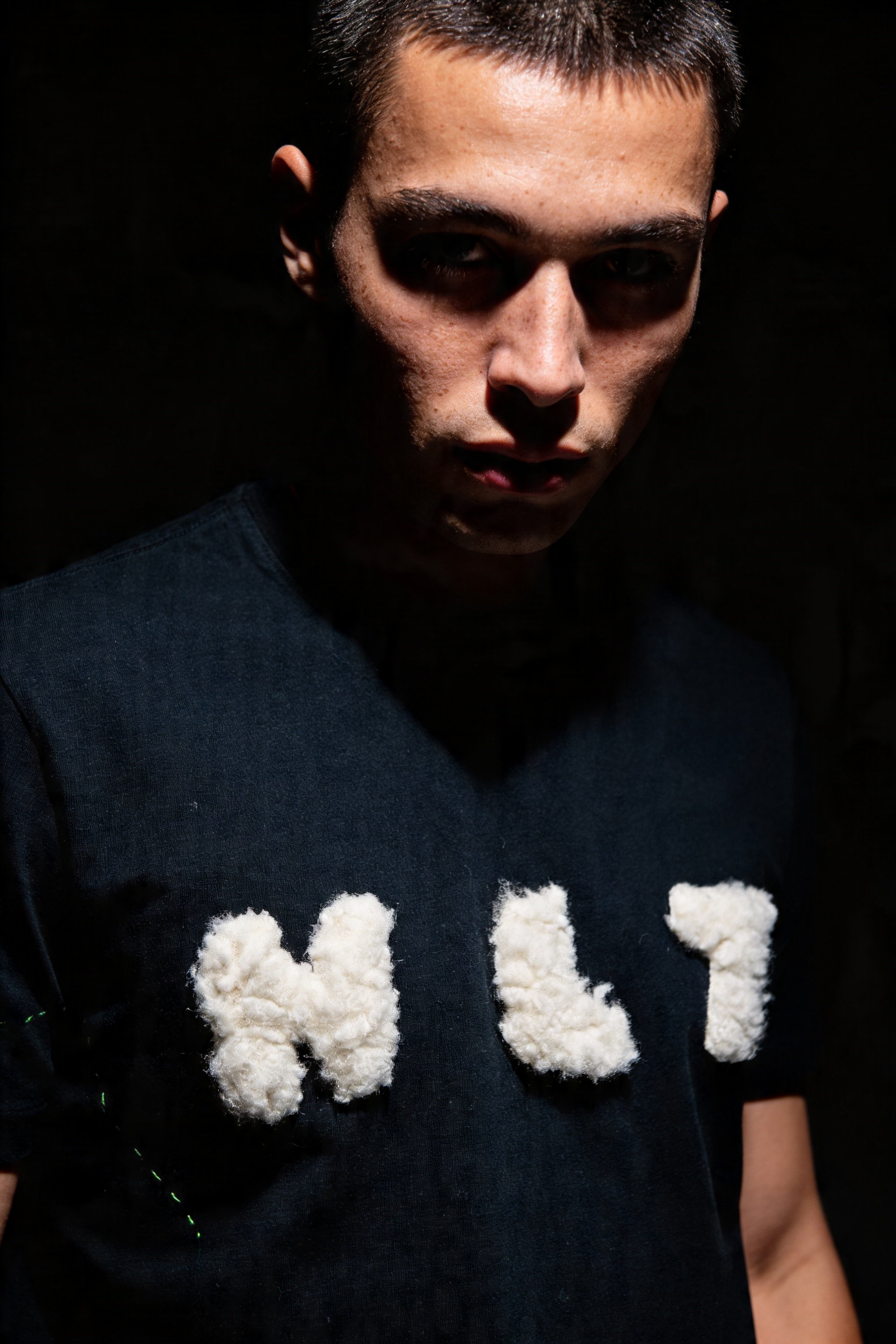 HLT444 dark portrait in black shirt